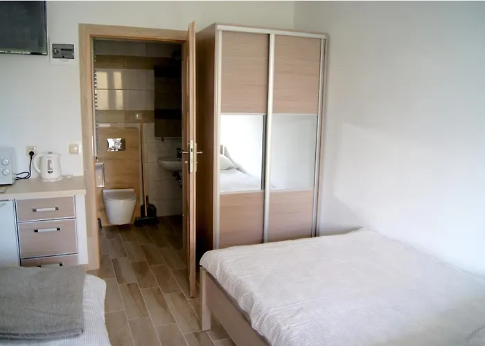 Rega Pokoje
